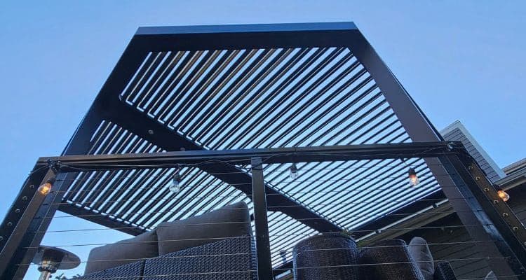 A Pergola That Opens and Closes Lets You Live Outdoors in Winter